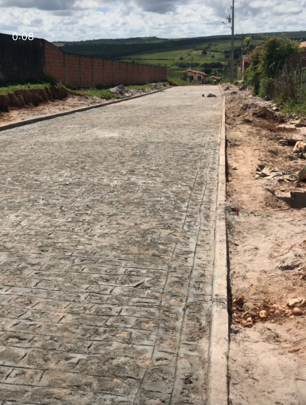 Pavimentação em paralelepípedo da Rua Caminho do Riacho